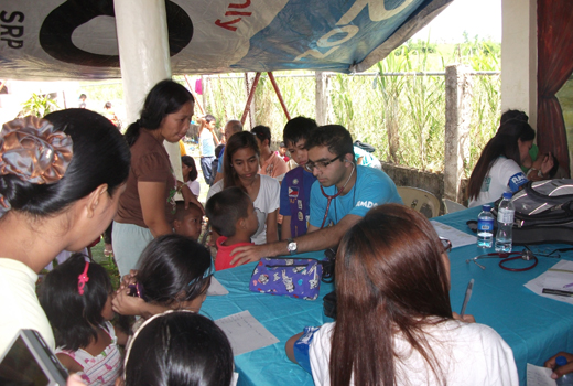 Dr Edmond Fernandes in relief mission in typhoon hit Philippines